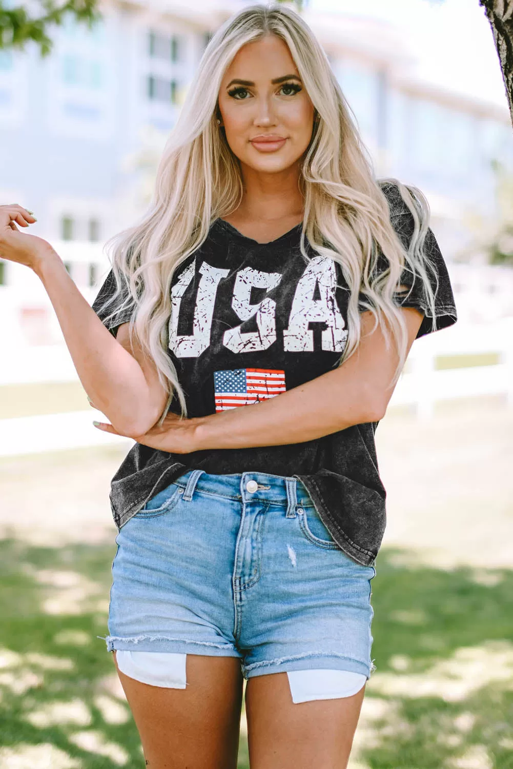 Celebrate America this Fourth of July with our USA Cutout Round Neck Short Sleeve T-Shirt, perfect for showing off your independence day spirit in style.